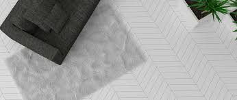 Blue subway tile on the backsplash blends neatly with the white marble countertops, keeping the space gorgeous gray cabinetry is complimented with a white and gray chevron backsplash in this spacious. Chevron Floor Floor Tiles By Wow