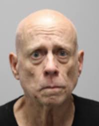 Teacher charged after recording device found in girl's locker room