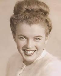 Dear Admin!** I wonder why you allow so many crappy fake photos of Marilyn  to be published here. She was very strict & careful in regard to her public  image &