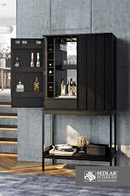 Entertain With Practical Style With This Modern Bar Cabinet In 2020 Furniture Modern Bar Cabinet Interior