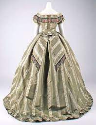 A key motif was the boteh or pine cone, what we know today as the paisley. 110 England 1860 1869 Women Ideas Historical Fashion Victorian Fashion Civil War Dress