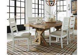 Set a generous table with our gorgeous dining room furniture, whether you're entertaining family and friends or enjoying a quiet meal at home. Grindleburg Dining Table And 6 Chairs Set Ashley Furniture Homestore