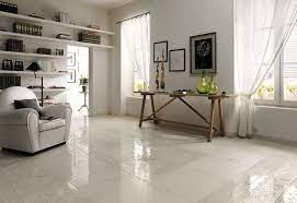 Here are 15 living rooms that make the best out of a little another sunken living area that used two different colors of floor tiles for the sunken flooring and the ones on the upper level. Textured White Ceramic Tile Border Floor Flooring Options Living Room Living Room Tiles Living Room Flooring