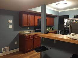 I have darker cherry colored cabinets. Kitchen Wall Paint Ideas With Cherry Cabinets