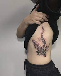 30 Angel Tattoo Design Ideas And The Meaning Behind Them In 2021 Hand Tattoos For Guys Angel Tattoo For Women Tattoos