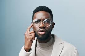 Earring in the Male Ear. Piercing Part of the Body Stock Image