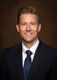 Dr. Marcus A. Crosby, MD