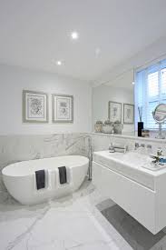 Half Tiled Marble Effect Walls And Floor Create A Dramatic Footprint In This Stunning Contempor Contemporary Bathroom Designs Bathroom Interior Bathroom Design