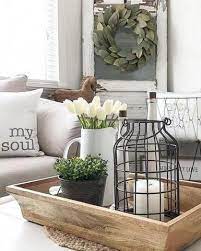 Rustic coffee tables can be perfect for a farm home living room because they are a beautiful piece of furniture. Light Wooden Tray And Farmhouse Coffee Table Decor Farmhouse Coffee Table Decor Farmhouse Decor Living Room Coffee Table Farmhouse