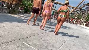 Lovely girls and wet butts all over water park - Voyeurs HD