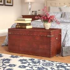 If the table is a coffee table made to look like a trunk, it may have drawers that conveniently open from the side for easy storage. Laurel Foundry Modern Farmhouse Leonid Vintage Trunk Wayfair In 2020 Coffee Table Trunk Furniture Coffee Table