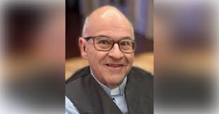 Obituary information for Rev. Dr. Robert Roland LaRochelle