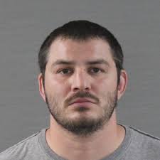 Former star wrestler, coach at Tascosa High School indicted by federal  grand jury