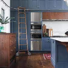 A multipurpose container offering a safe support, a toilet roll holder and a tilting mirror.‎ Kitchen Cabinet Ladder Design Ideas