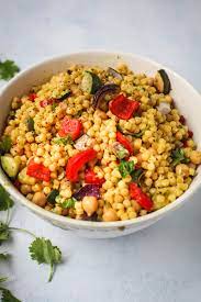 Golden Garlic Couscous With Vegetables Chickpeas Recipe Couscous Recipes Vegetarian Recipes Healthy Couscous