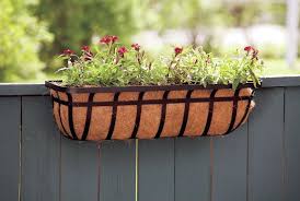 Charming window boxes on deck railing. Cute And Functional Deck Rail Planter Ideas