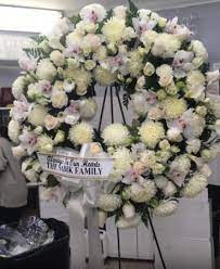 Maybe you would like to learn more about one of these? All White Standing Wreath In New York Ny Bella S Flowers New York City