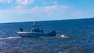 Father dies, son rescued after trying to swim away from sinking boat