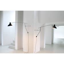 An artist, an engineer and in no small measure a handyman, he devised a clever system of counterweights combined with a series of strong and flexible metal bars. Mantis Bs2 Black Walllamp Schottlander Buy Online