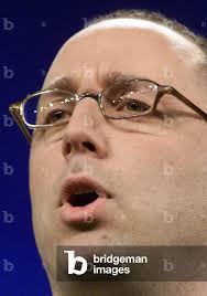 Image of Michael Fleisher, CEO di Gartner, fa un'osservazione partecipando al  Gartner