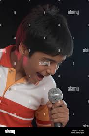 Child karaoke hi-res stock photography and images