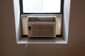 With a sleek design, a digital control interface with and led thermostat and a compact remote control. How To Hide An Ugly Window Air Conditioner Tips For Disguising Window Ac