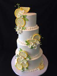 Wedding Cake Designed To Brides Theme Of Lemons Yellow Tinted Icing With Fondant Lemons Flavor Of Th Lemon Wedding Cakes Creative Cupcakes Cake Dessert Table