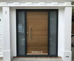 Maybe you would like to learn more about one of these? Contemporary Oak Door Grey Frame Sidelights Contemporary Front Doors Timber Front Door Front Door Design