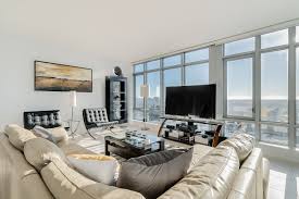 Lower back sofas and chairs, so as not to obscure sight lines and preserve a feeling of openness. Dreamy Sunsets Ocean Views And Urban Luxury 36th Floor Vancouver Condo Has It All