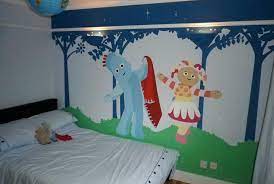 The lights follow a narrow path for a skinny palm tree feeling with four large green palm leaves that light up. In The Night Garden Bedroom Ideas The Expert