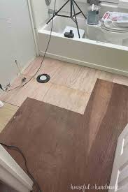 Bathroom subfloors are no different that any other subfloor, with the exception that bathrooms lay the first sheet of plywood perpendicular to the floor joist. How To Install Peel And Stick Vinyl Tiles Houseful Of Handmade