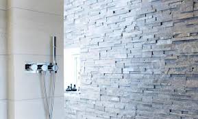Stone bathtubs look amazing and warm, and so do the washbasins. Natural Stone Shower Walls Stacked Stone Veneer Panels For Shower Walls