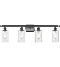 The right bathroom lighting transforms a space, especially when paired with matching fixtures. Innovations Lighting 516 4w Bk G802 Ballston Clymer 4 Light 36 Inch Matte Black Bath Vanity Light Wall Light In Clear Glass Ballston