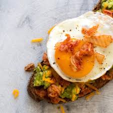 Avocado Toast With Egg Cheddar Kimchi Recipe Avocado Toast Egg Healthy Work Snacks Fermented Foods