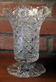 A floral motif is engraved on the vase and candleholder. Is This Vase American Brilliant Cut Glass Who What Pattern Antiques Board