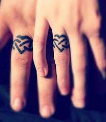 Tribal Or Celtic Heart Wedding Ring Tattoo Design Ring Tattoo Designs Ring Finger Tattoos Wedding Ring Finger Tattoos
