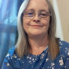 Woolworths , High Street , Elgin , Morayshire ... Store 335 1988 and Store  Manager Jim Ripley is seen presenting a Gold Watch to Mrs Liz Smith who was  Celebrating her 21