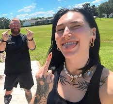 Buddy Matthews with the matching jacket of his wife Rhea Ripley