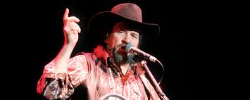 The Meaning Behind "I Ain't Living Long Like This" by Waylon Jennings and  Why Rodney Crowell Went to Jail to Finish Writing It - American Songwriter