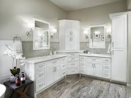 It has a high gloss to the tile. Contemporary White Master Bathroom With Double Vanities And Gray Glass Subway Tile Backsplash Hgtv