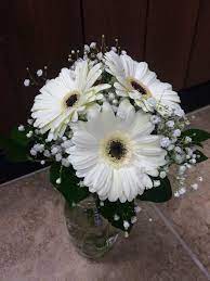 Posted 12 years ago in flowers. Sunshine Designs Florist Pensacola Florida Gerbera Daisy Bouquet Gerbera Daisy Centerpiece Daisy Bouquet Wedding