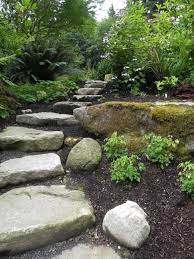 Black frost steppers (small flagstone) diy backyard patio stone projects or outdoor patio paver walkways front yard landscape design. Natural Stone Steps Sublime Garden Design Landscape Design Serving Snohomish County And North King County Sloped Garden Landscaping With Rocks Landscape Design