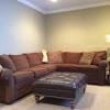 A living room in brown and beige looks inviting, peaceful, calm and comfortable. 1
