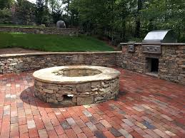 Backyard retaining wall fire pit. Natural Stone Retaining Wall Brick Patio Outdoor Grill Fire Pit Traditional Patio Charlotte By Charlotte Pavers Stone Houzz