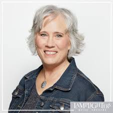 Meet Kelly Powers, a member of Lamplighters for twenty-three years and one  of our fantastic Gala Committee writers for over a decade! Her offerings of  puns, silly plot ideas and creative, timely