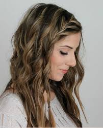 So for the second step you want to comb all of the hair backwards and then take a small section in the front at the base of your head and separate it into 3 sections. 30 Elegant French Braid Hairstyles