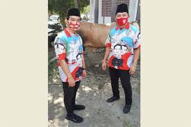 Ide model baju pendekar jawa. Detail Baju Seragam Gibran Dan Teguh Ada Gambar Pasar Klewer Solo Dan Banteng Hitam