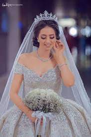 Wedding hairstyles down with veil and crown may prove only the accent you should bring an official appearance to your hair. Bridal Hairstyles With Tiaras Arabia Weddings