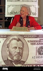 Treasurer of the United States Mary Ellen Withrow shares a laugh after  personally signing a new redesigned $50 bill Friday, Oct. 31, 1997, in San  Diego's Horton Plaza. The new bills went