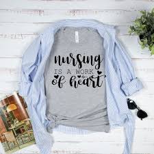 Nurse shirts are also not too common so if you see something you like, snag it for yourself or a nurse bff. Nursing Is A Work Of The Heart Love Nurse Nurse Life Nurse Etsy Nursing Shirts Funny Nurse Shirts Superhero Shirt